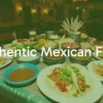 Colorful table spread of authentic Mexican food including tacos, mole, and fresh ingredients, vibrant and inviting, traditional setting, warm lighting, festive mood.